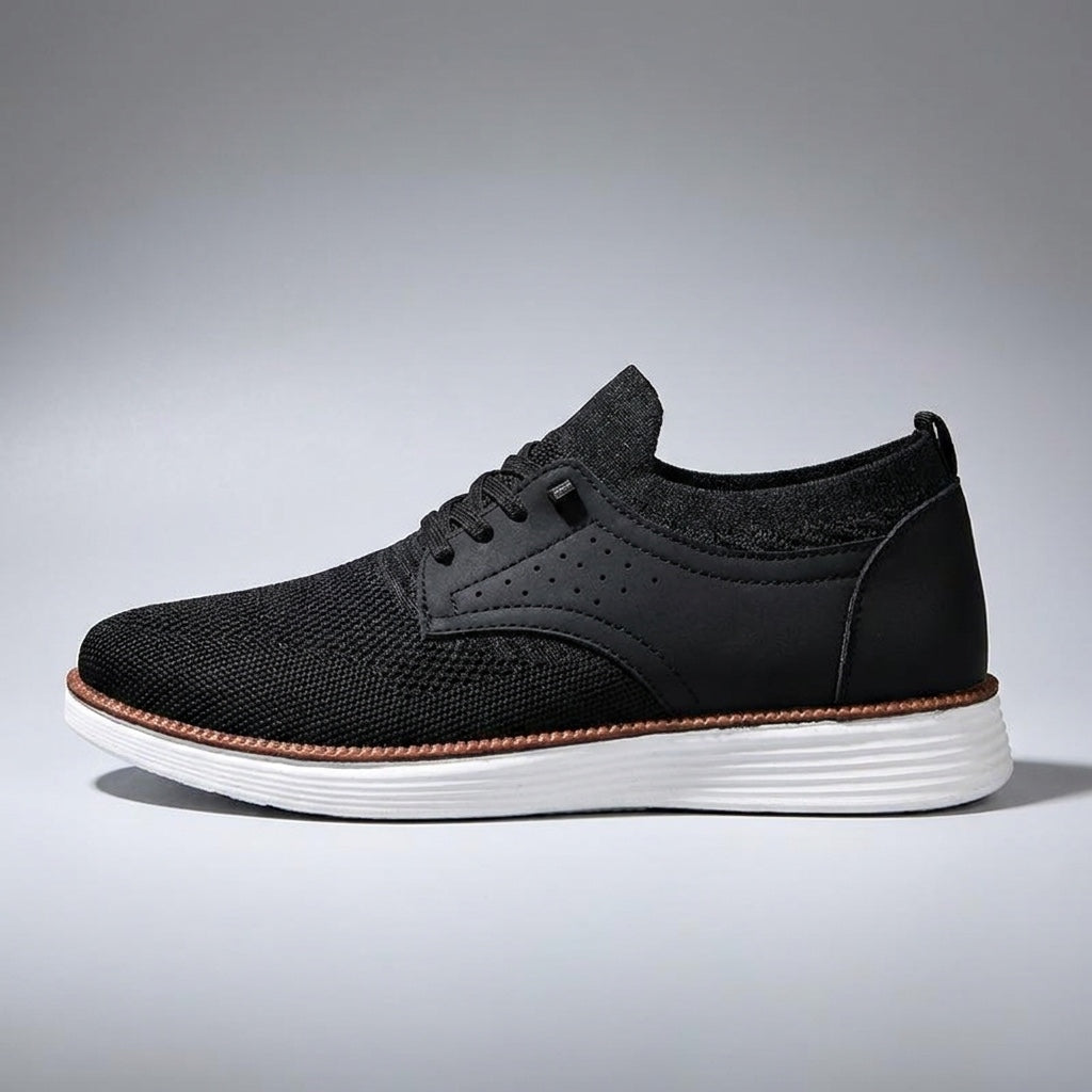 Formia Mesh Sneakers — Black, side profile, studio backdrop