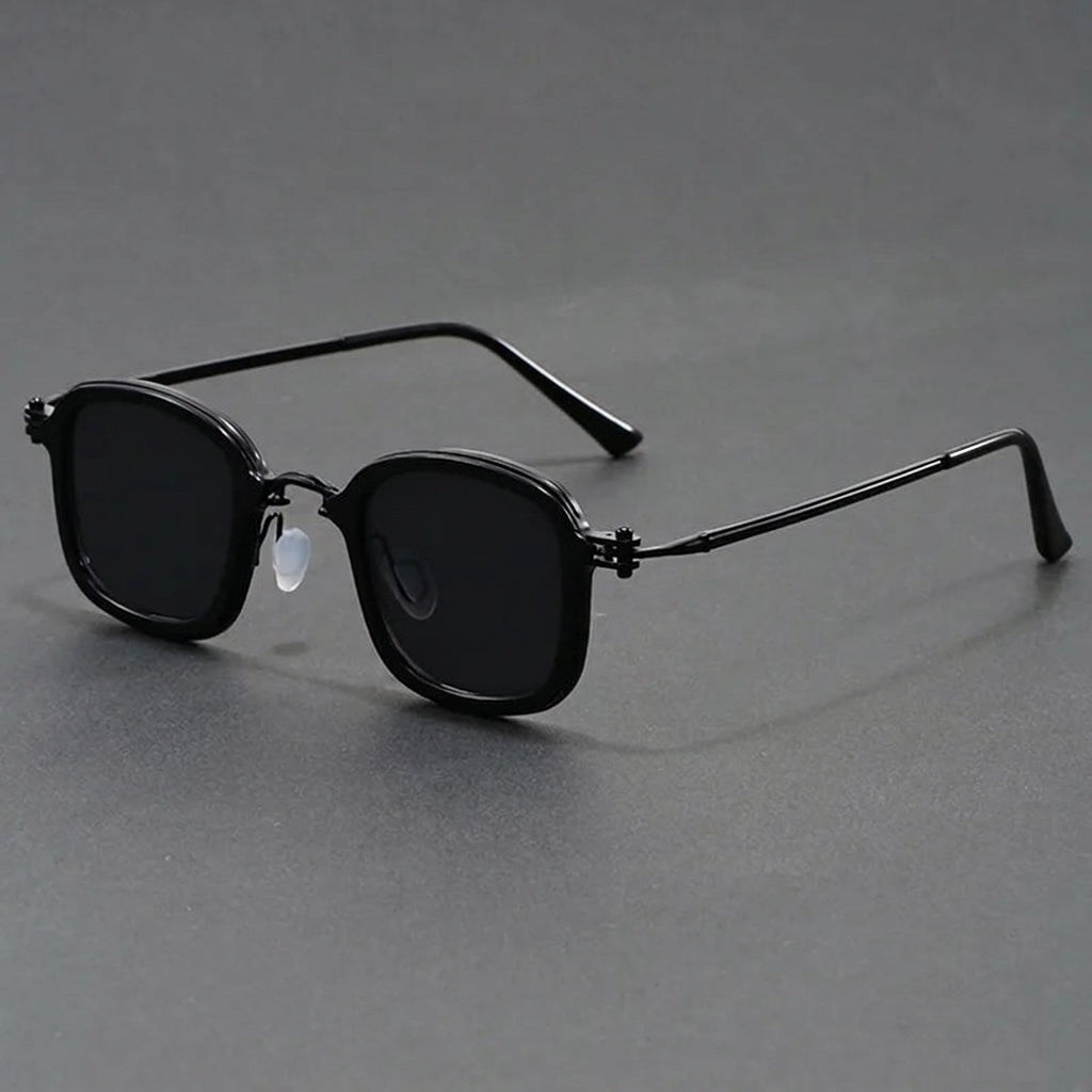 Brindisi Metal Sunglasses — Black, three-quarter studio view
