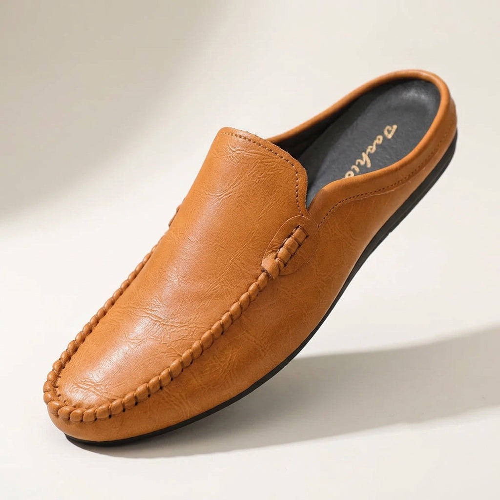 Maiori Leather Mules — Tan, three-quarter studio view