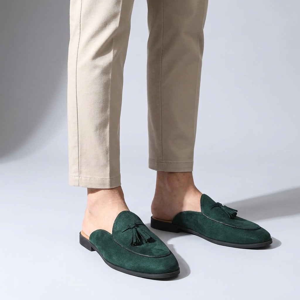 Pienza Suede Mules — Dark Green, male model knee-down studio