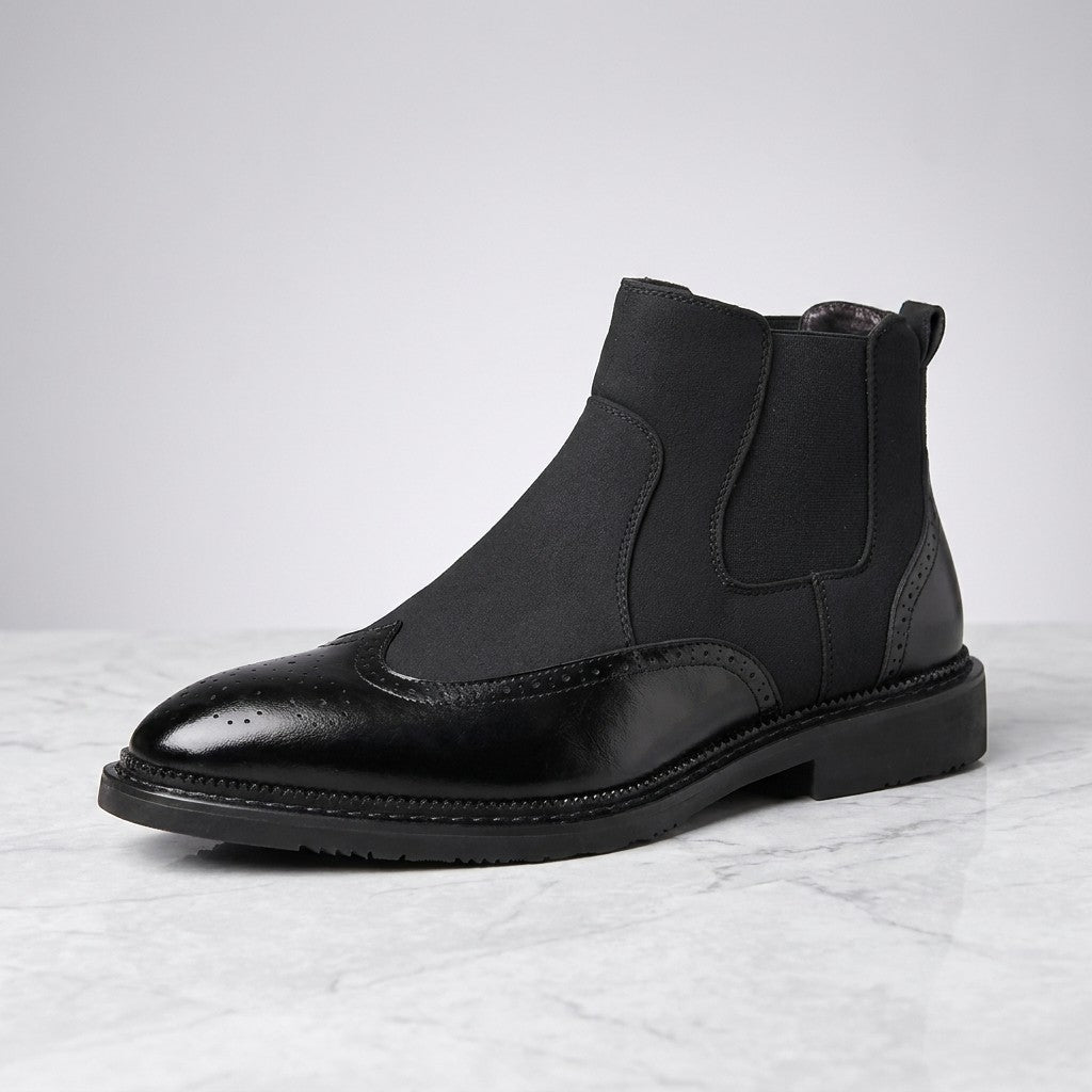 Dozza Brogue Chelsea Boots — Black, single boot in side profile on light grey marble