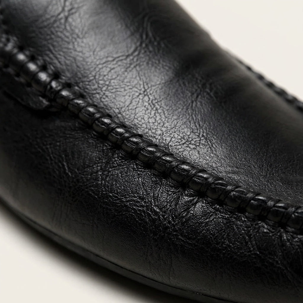 Maiori Leather Mules — Black, close-up of hand-stitched moccasin seam
