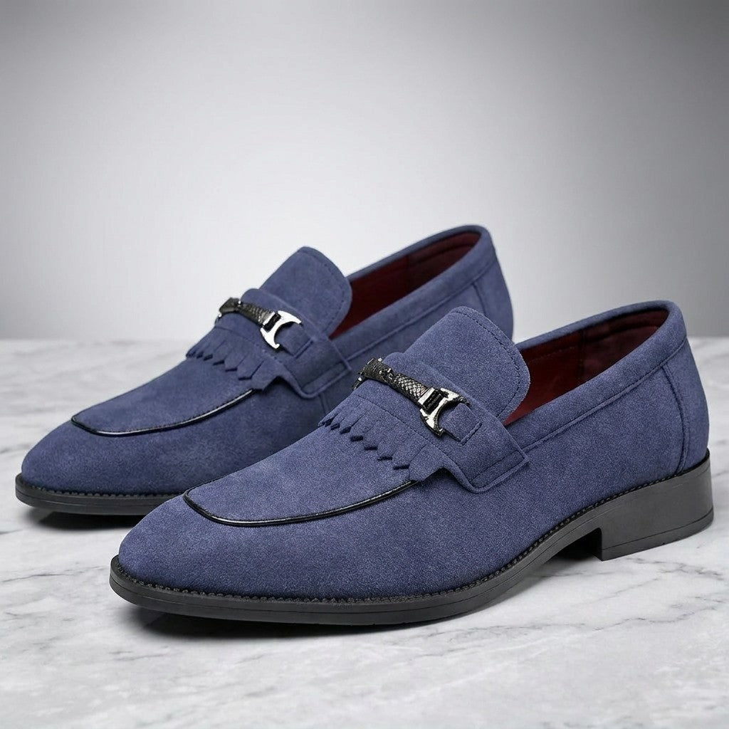 Maratea Kiltie Bit Loafers — Blue, pair of kiltie bit loafers, three-quarter view on light grey marble
