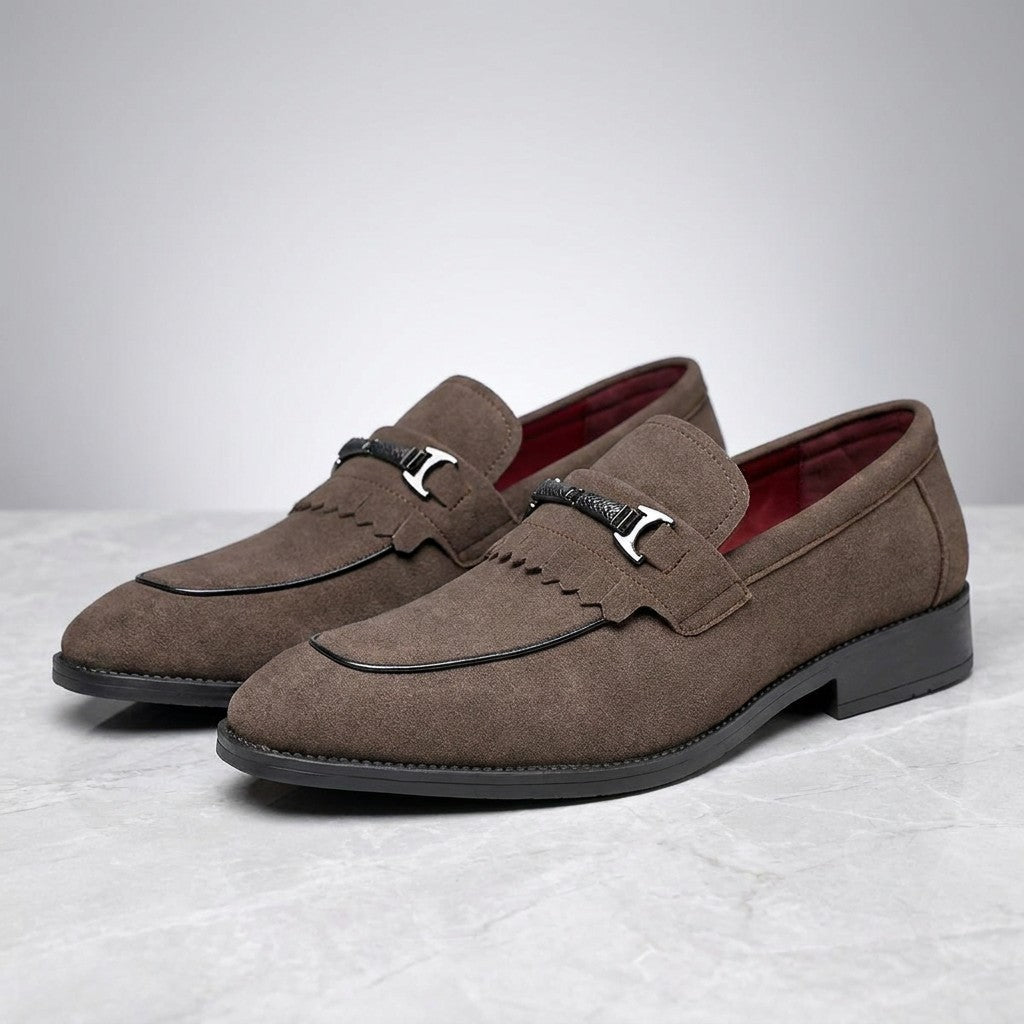 Maratea Kiltie Bit Loafers — Brown, pair of kiltie bit loafers, three-quarter view on light grey marble
