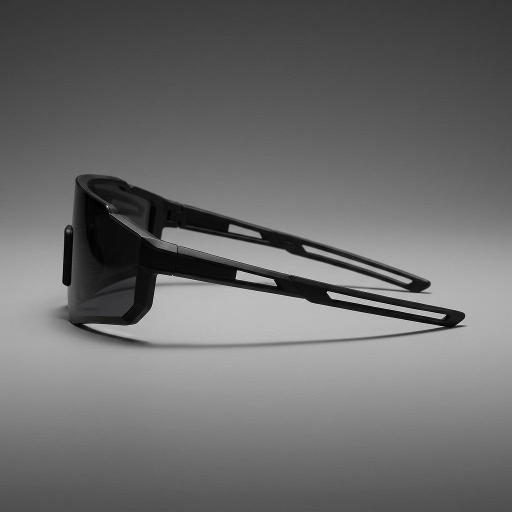 Marciana Sport Sunglasses — Black / Smoke, side profile showing the arm on a grey studio gradient