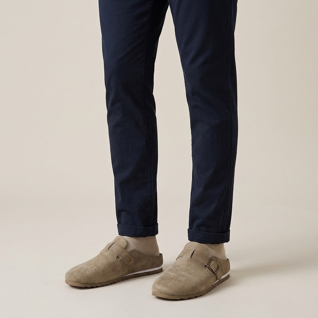 Tivoli Suede Mules — Sand, worn on model, studio