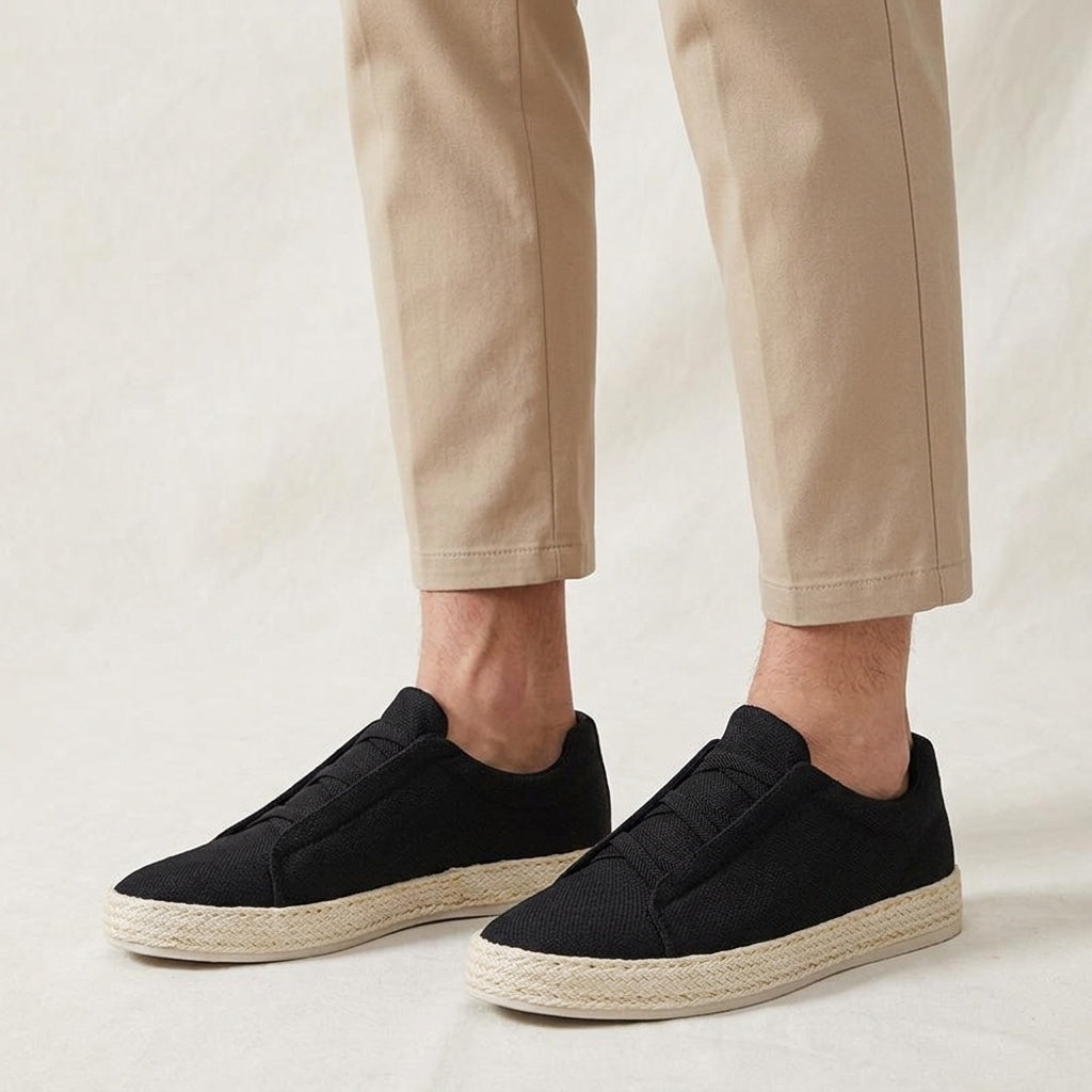 Bosa Espadrille Sneakers — Black, worn with beige chinos, studio