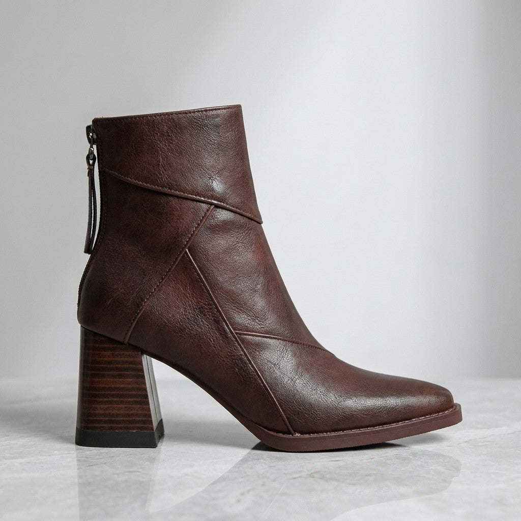 Arona Paneled Ankle Boots — Brown, single boot in side profile on light grey marble