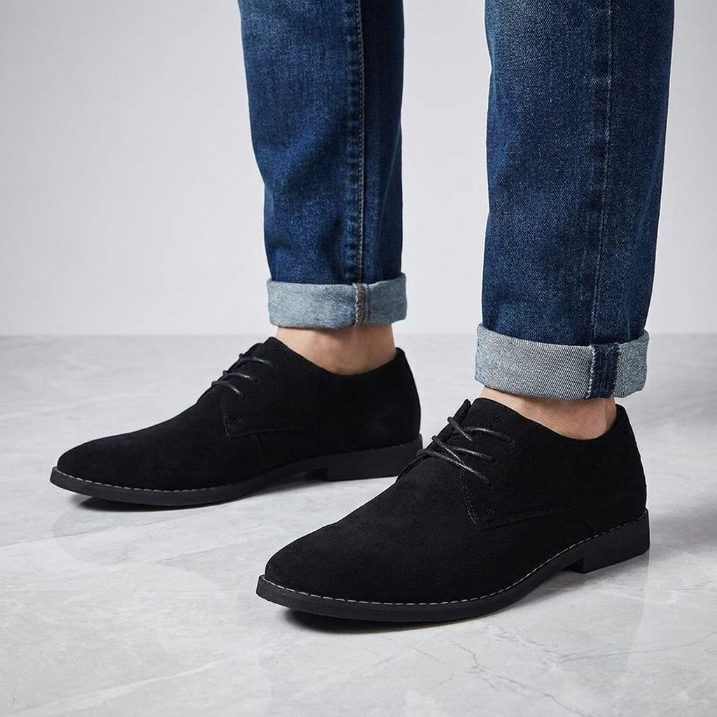 Lecce Suede Oxfords — Black, on-model knee-down studio