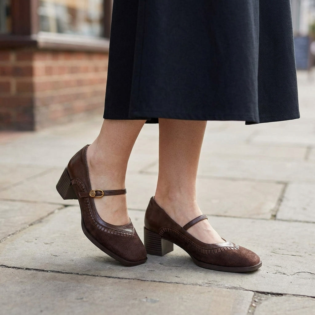 Lodi Buckle Mary Janes — Brown, on model city cafe sidewalk