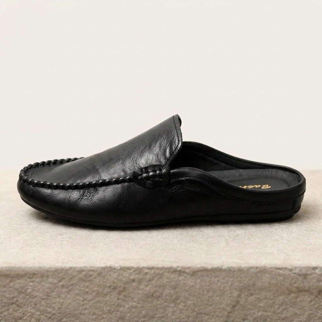 Maiori Leather Mules — Black, side profile studio view