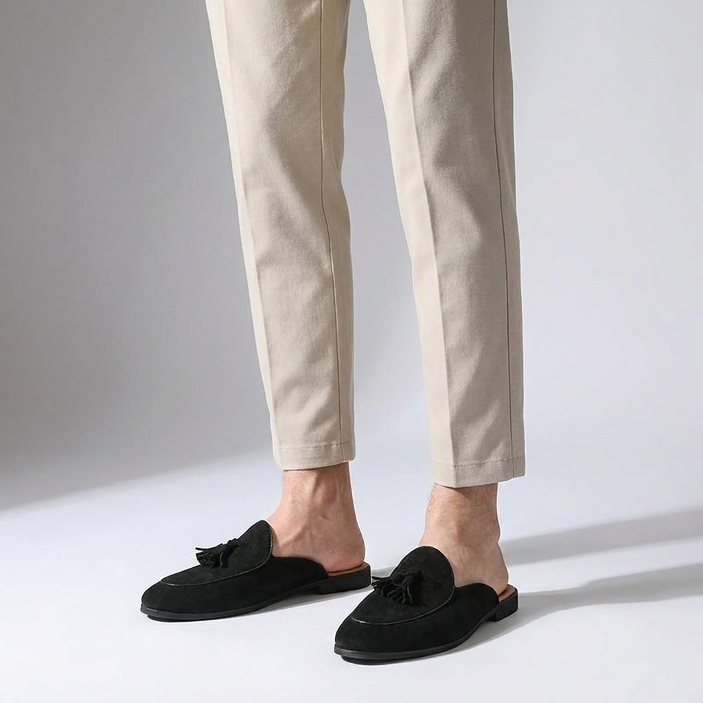 Pienza Suede Mules — Black, male model knee-down studio