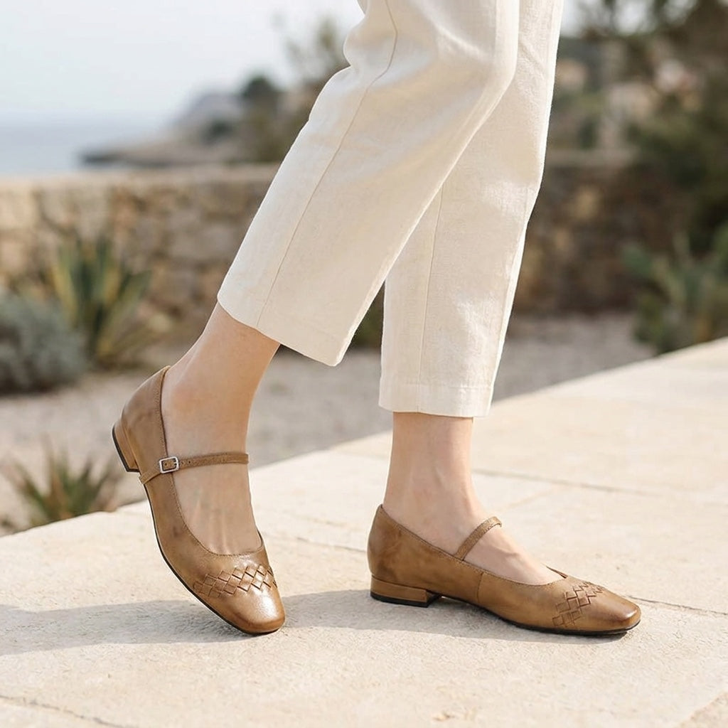 Cremona Mary Janes — Tan, worn outdoors on a stone terrace, from the knee down