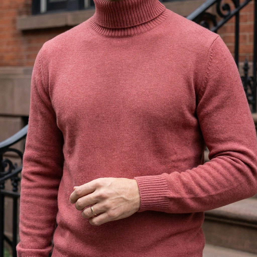 Macerata Merino Wool Turtleneck — Coral Red, worn close-up of the cuff and knit