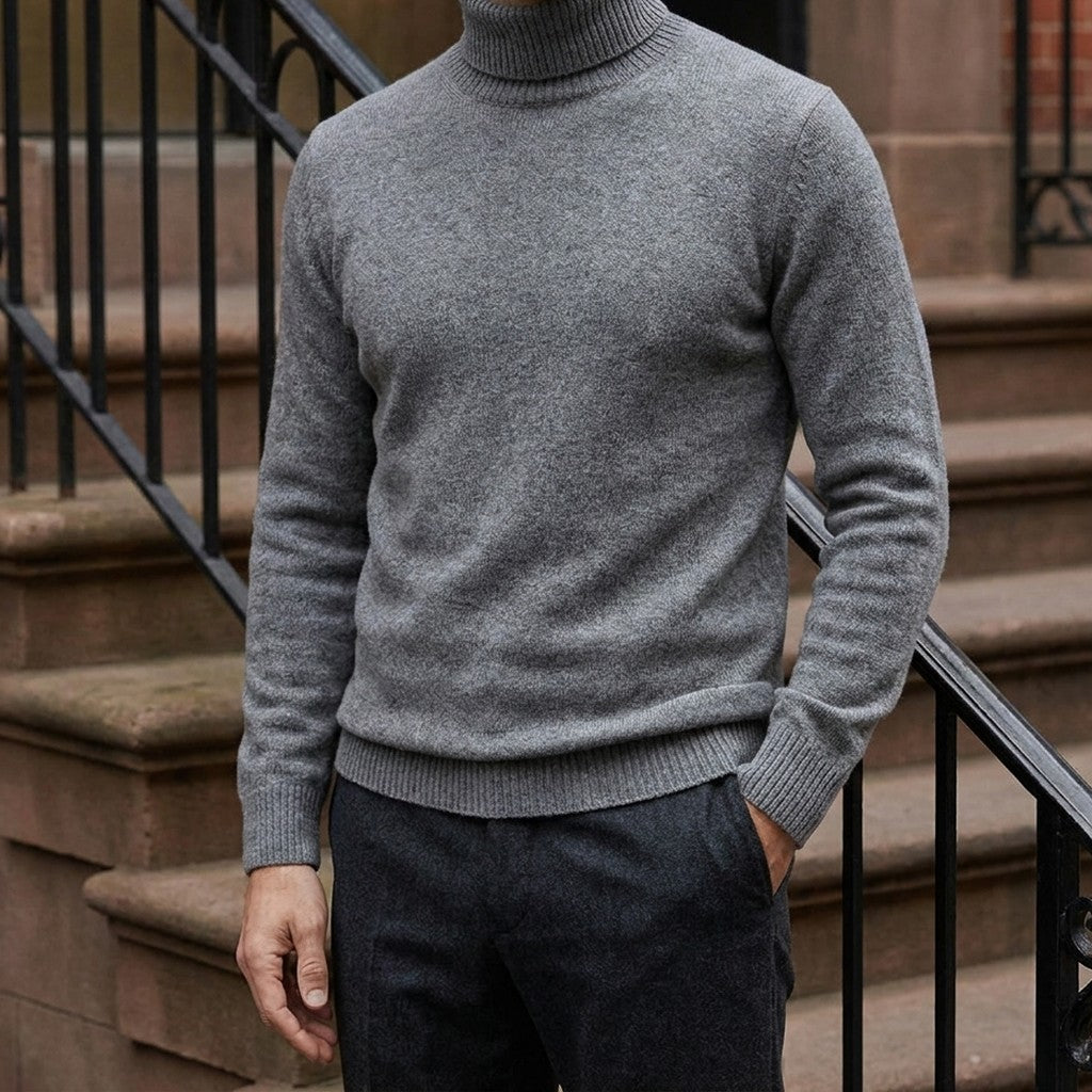 Macerata Merino Wool Turtleneck — Charcoal, worn on a brownstone stoop