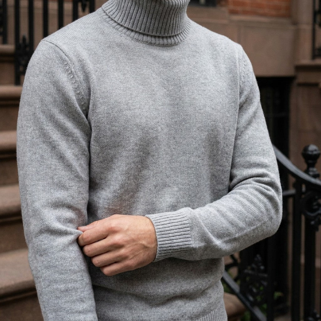 Macerata Merino Wool Turtleneck — Light Grey, worn close-up of the cuff and knit